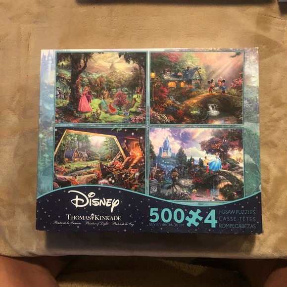 Thomas Kinkade Disney box of puzzles. Four puzzles each 500 pieces. - Picture 1 of 2